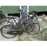 Three vintage bicycles.