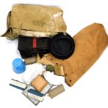 A World War II ARP medical satchel, first aid tin, and associated equipment.