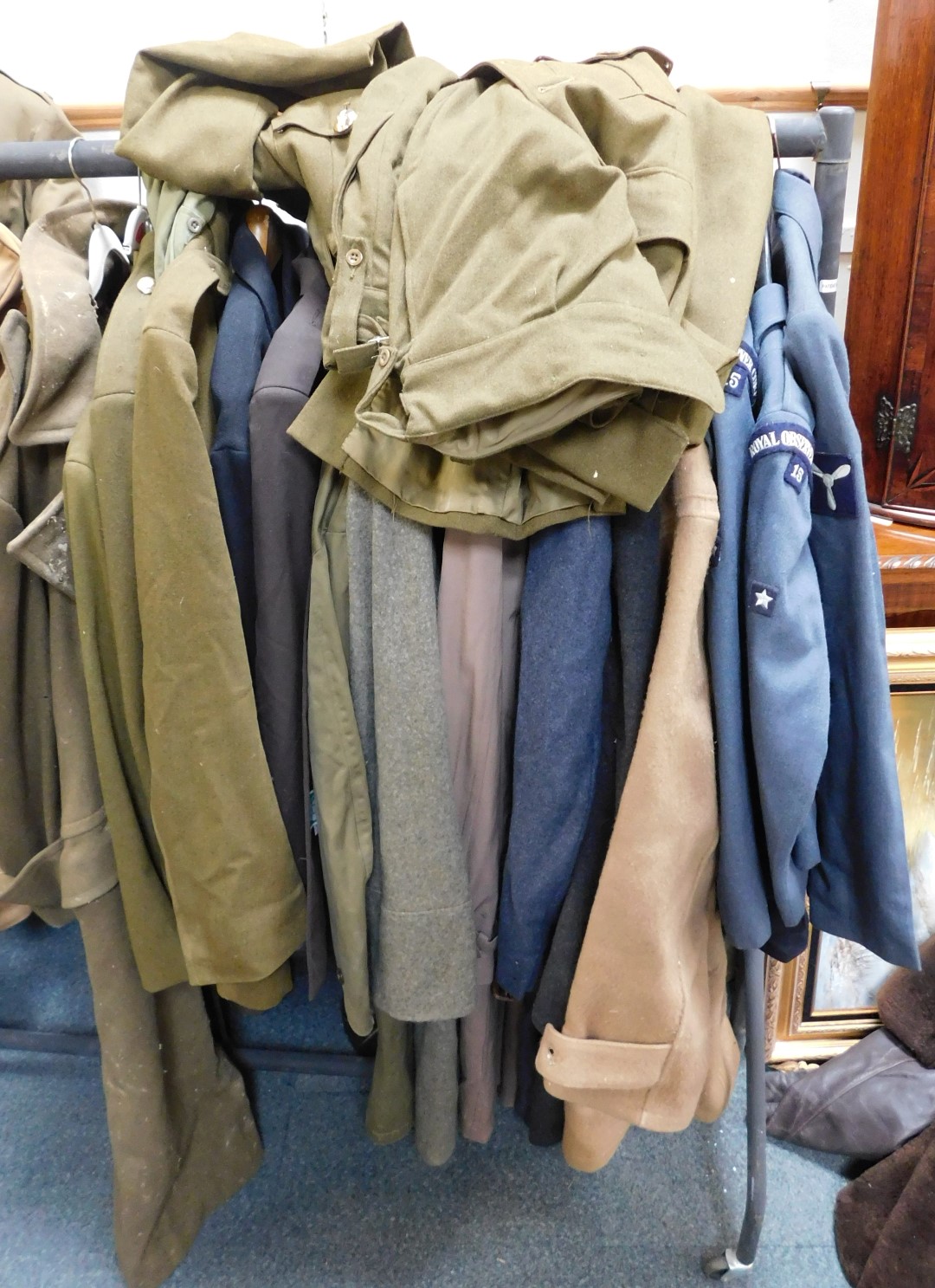 A large quantity of military related uniform, to include Royal Signals great coat, Royal Observer Co