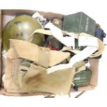A selection of military items, to include helmet, tins, webbing packs, torch, etc.