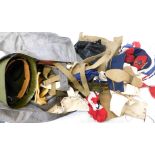 A quantity of military items, to include webbing pouches, modern German cap, straps, thermos flask,