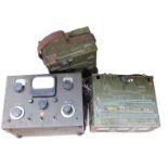 Two military British Army batteries and associated radio set.
