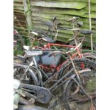 A quantity of various bicycles, of various vintage.