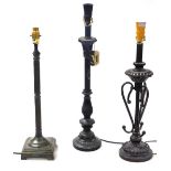 A Minster black column form table lamp, 62cm high, column table lamp, 44cm high, and a further table