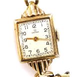 An Omega lady's gold plated wristwatch, rectangular silver dial bearing Arabic numerals, on a plated