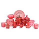 A group of Victorian and later cranberry glass, including bowls, vases, creams jugs, cups, etc. (a q