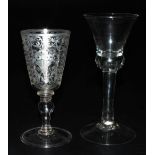 A Georgian balustroid wine glass, the bell shaped bowl with air bubble inclusions to the bottom, rai