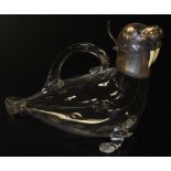 A Victorian silver mounted cut glass walrus claret jug, with inset glass eyes, and ivory tusks, Alex