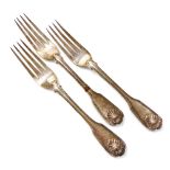 Three Victorian Fiddle and Shell pattern silver table forks, London 1849, 9.82oz.