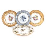 A group of four Rockingham and Ridgway porcelain plates, variously decorated with flowers.