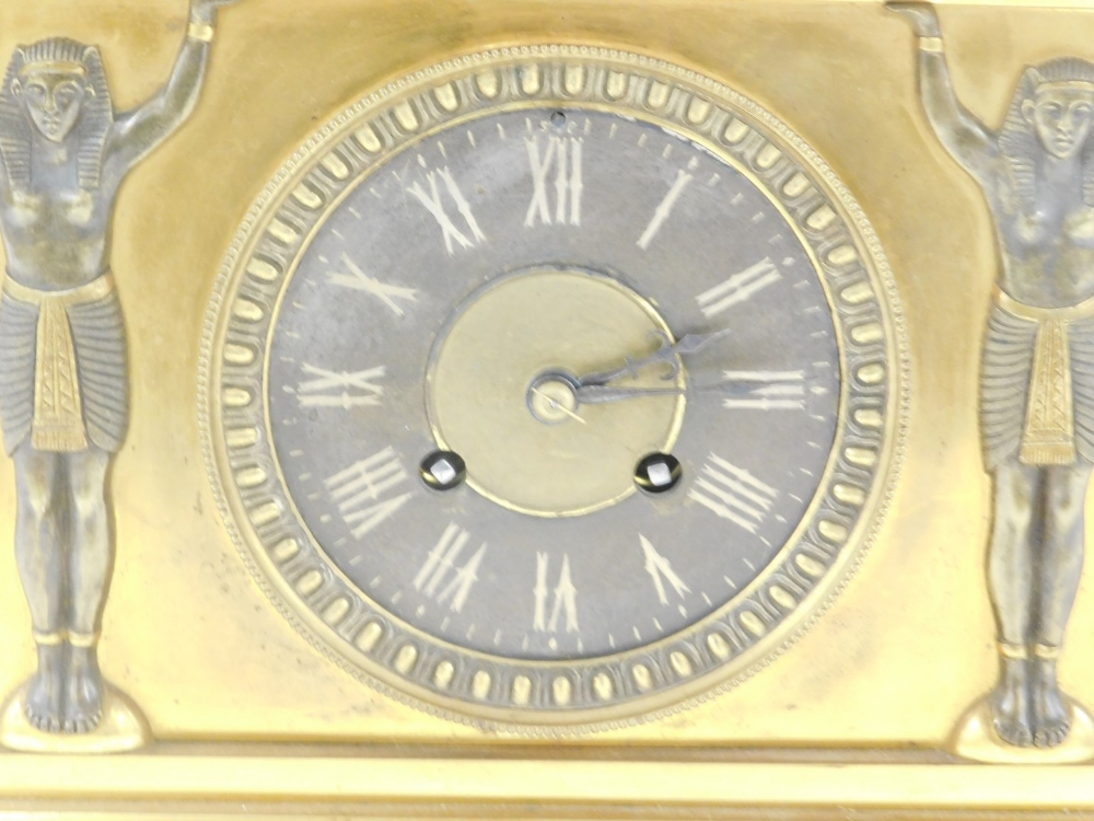A late 19thC French Egyptian Revival brass cased mantel clock, circular dial with chapter ring beari - Image 3 of 5