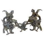 A pair of late 19thC French bronze chenets, of eighteenth century form, cast with a seated lady, and