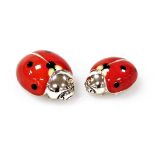 Two Saturno silver and enamelled ladybirds, each marked 925, 3.5cm and 3cm wide.