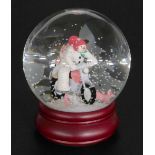 A Coalport Characters The Snowman snow globe, Hold On Tight, 14cm high.