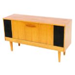 A Stereosound Productions Limited teak cased radiogram, with a lit fully fitted interior, serial num