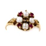 A 9ct gold ruby and pearl ring, in a floral design, claw set, central stone lacking, size O/P, 2.1g.