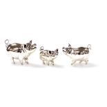 Three Saturno silver figures modelled as pigs, each in standing position, each marked 925, 3cm, 2.7c