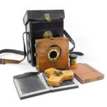 An early 20thC Marlow Brothers number 1 field camera, with a lens, stand, and plates, black leather