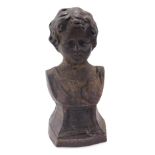 A late 19thC French cast iron bust, of a boy, titled 'L'Amour Vairoueur', 20cm high.