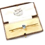 A Victorian aquamarine set bar brooch, in yellow metal, stamped 15ct, in a Kendal & Dent box, 4.0g