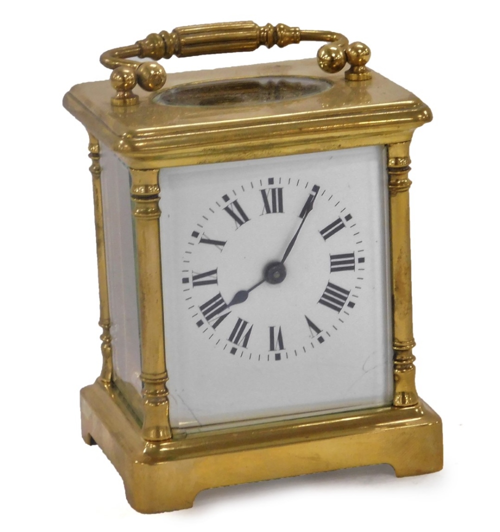 A 20thC French brass carriage clock, rectangular enamel dial bearing Roman numerals, single barrel m
