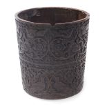 A late 19thC Anglo Indian carved wooden cylindrical bucket, carved with panels of birds and scrollin