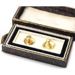 A pair of 9ct gold shirt studs, boxed, 1.9g.