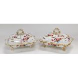A pair of early 19thC Coalport porcelain vegetable tureens and covers, painted with sprays of flower