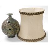A late 20thC Studio pottery table lamp, with pierced and incised abstract decoration, 34cm high, tog