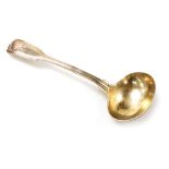 A Victorian silver Fiddle pattern cream ladle, the handle cast with shell decoration, William Eaton,