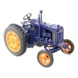 A Chad Valley Fordson Major model of a tractor, with a blue chassis, 16cm wide.