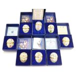 Eight Halcyon Days enamel egg shaped trinket boxes, differing designs, to include flowers, teddy bea