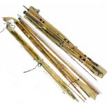 A vintage bamboo three piece split cane fishing rod, and two further bamboo three piece split cane f