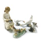 A Lladro porcelain figure of a kitten, with a mouse on its tail, Lladro goose, Nao goose, hen and ch