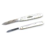 An Edward VII silver and mother of pearl bound folding pocket knife, Sheffield 1910, and a mother of