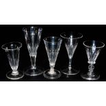 Five 18thC and later glasses, including two dwarf ale glasses with fluted bowls, one with an inverte