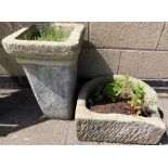 A composition plant pot, of square tapering form, 56cm high, together with a planter trough, 50cm wi