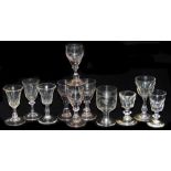A group of early 19thC and later small wine or liqueur glasses, to include a set of four with pink t
