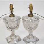 A pair of Victorian glass oil lamps, of hexagonal form, converted to table lamps, 35cm high.