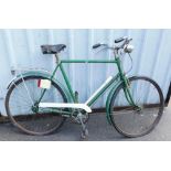 A Barker and Wigfall Royal bicycle, in green trim, with an AE Wilby Ltd leather seat.