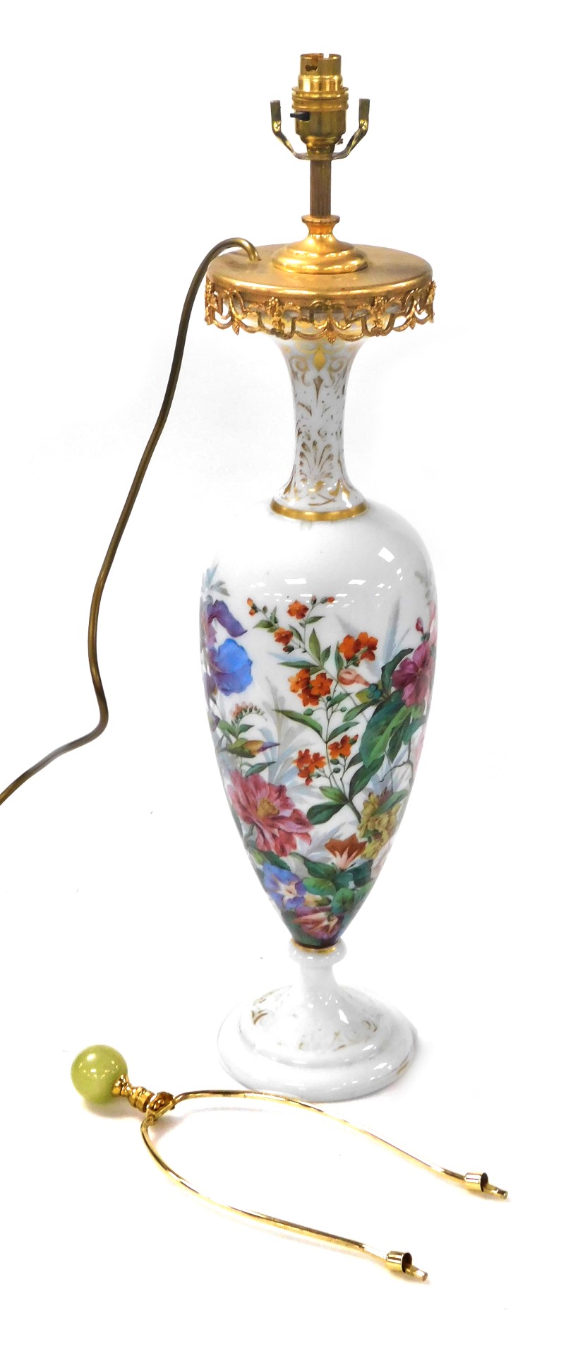 An 18thC French milk glass vase, of baluster form, painted with flowers, brass mounted and converted