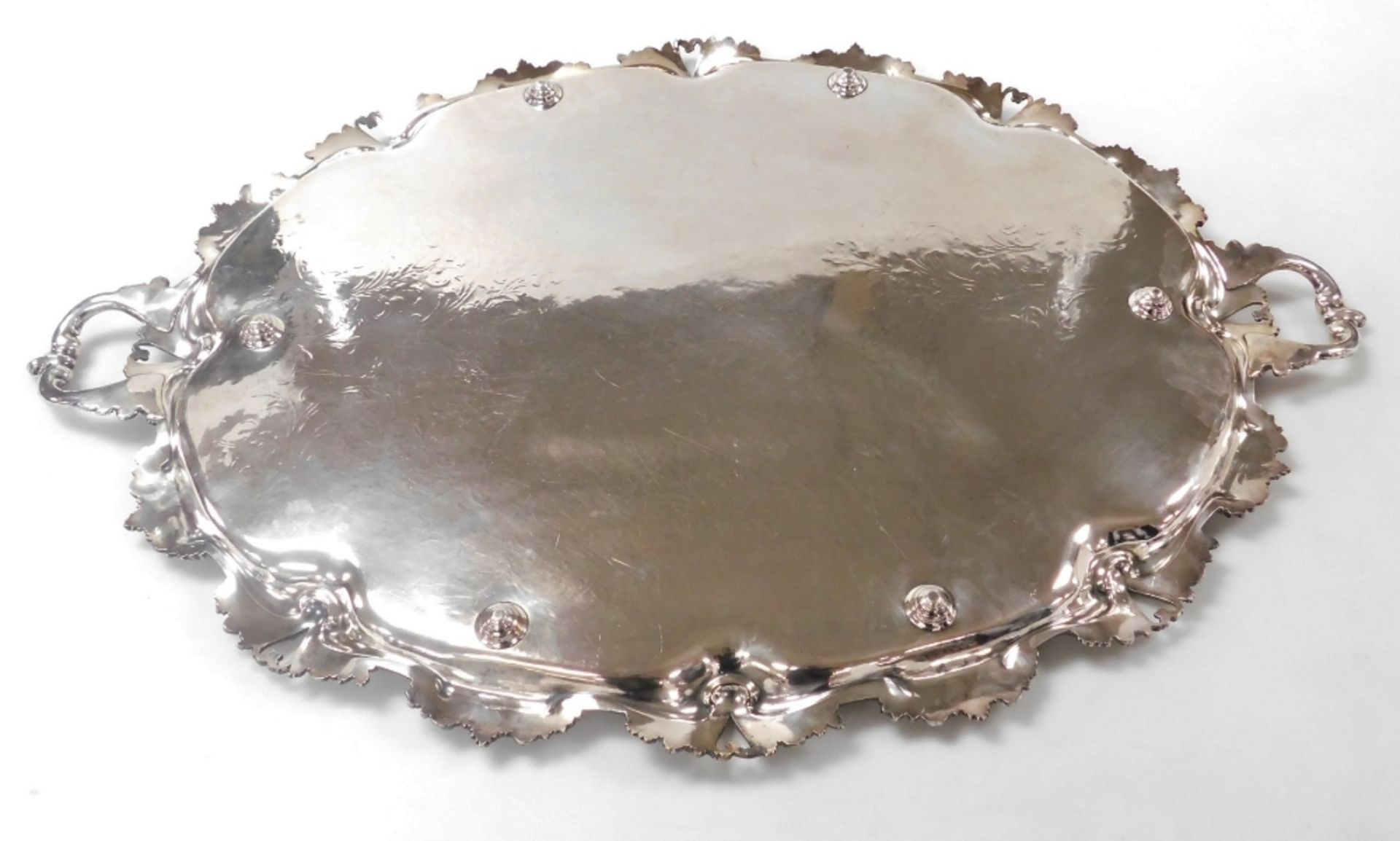 A Victorian silver plated twin handled tray, with central floral and foliate engraving, within a rai - Image 3 of 3