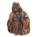 An early 18thC Continental carved wood ecclesiastical figure, of half length form, polychrome decora