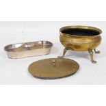 A Victorian oval brass coal bucket, raised on four paw feet, 37cm wide, a brass lid, 41cm wide, and