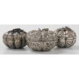 Three Indian white metal trinket boxes, each in the form of a pumpkin or other squash type fruit, of