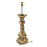 A late 19thC Continental painted wooden pricket candlestick, converted to a table lamp, 66cm high.