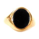 A 9ct gold and black onyx gentleman's signet ring, size N, 4.1g.