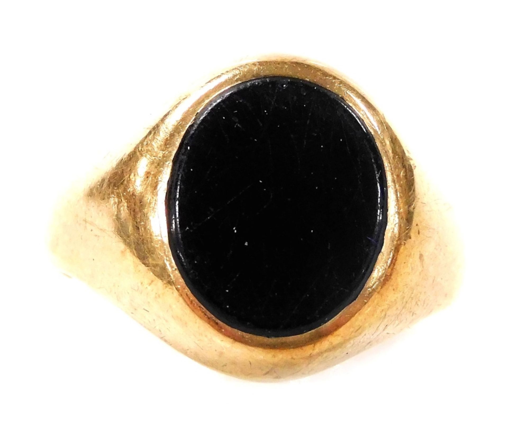 A 9ct gold and black onyx gentleman's signet ring, size N, 4.1g.