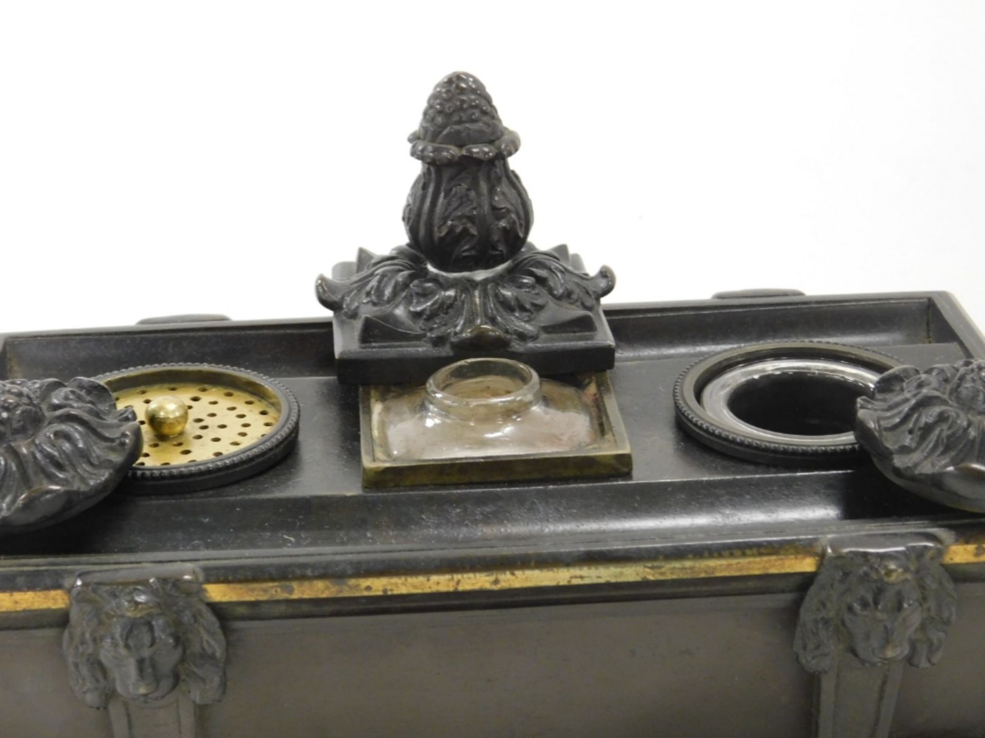 A late 19thC bronze desk stand, formed as a sarcophagus, with twin ring handles, the top with a cent - Image 3 of 4