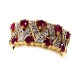 A 9ct gold ruby and diamond ring, in a compressed lattice work design, size I, 3.5g.